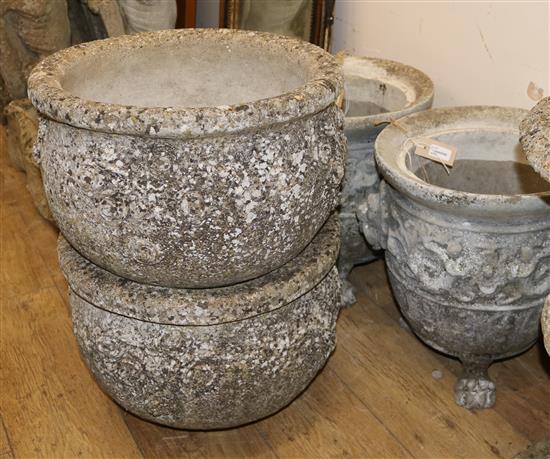 A pair of reconstituted stone planters raised on claw feet and another pair of planters, H 44cm & 31cm